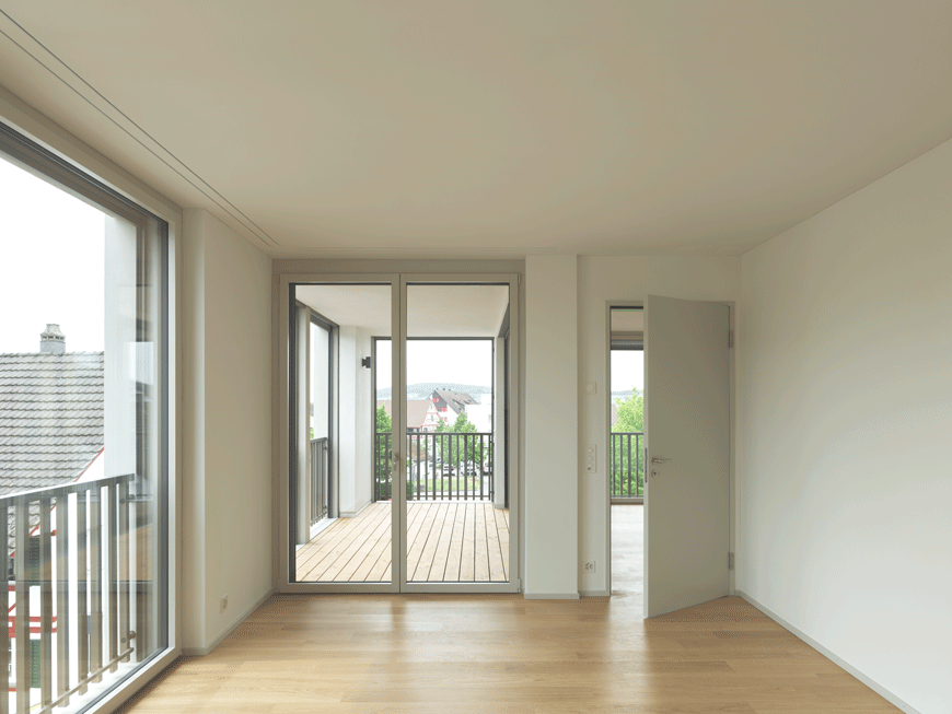 Ersatzneubau Zentrumweg, Niederhasli - Wohnzimmer mit Loggia